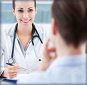 Physician consulting a patient
